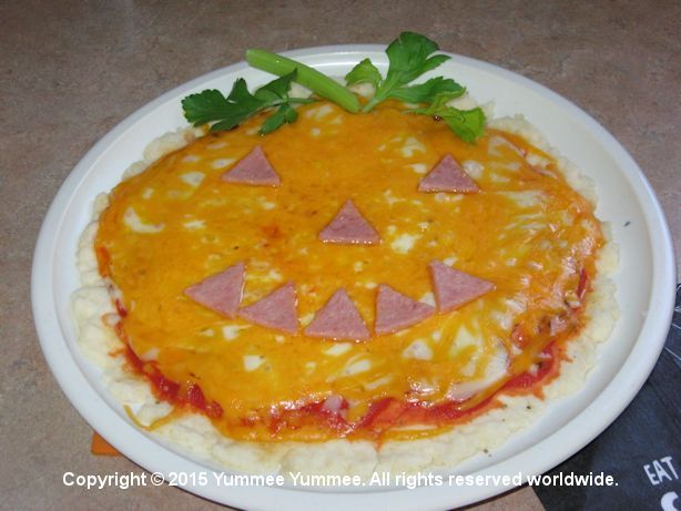 Build a Jack O'Lantern on your pizza. He is delicious.