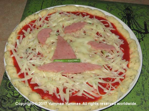 Cast your spell with a witch's hat gluten-free pizza.