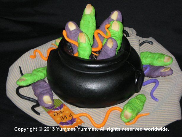 Make our Wicked Witches' Fingers cookies. Make 'em crooked, twisted, fat, skinny, short, or long - shape by hand. Let the kids help.