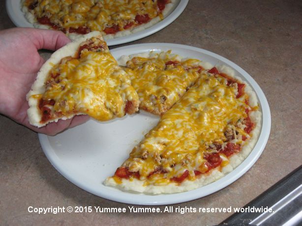 Use your microwave and make pizza like this.