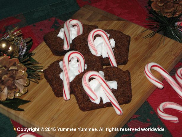 Gingerbread Slices Whipped Cream & Candy Canes - Gingerbread, Peppermint, and a dash of whipped cream.
