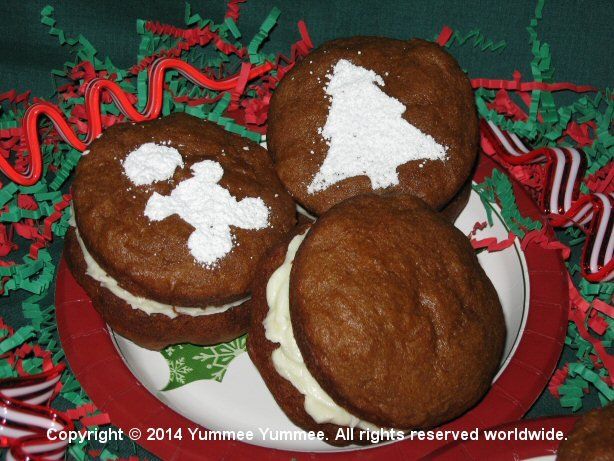 Whoopie Pies with Orange Cream Cheese Filling & powdered sugar decorations. Breakfast for 'True Believers'.