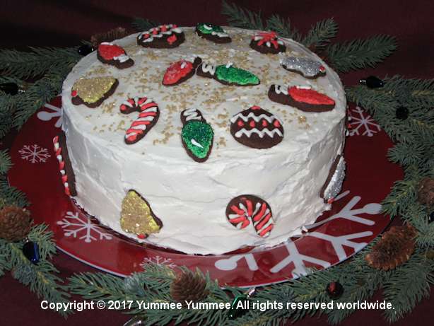 Cake with cookie decorations, frosted in Sandwich Cookie Filling