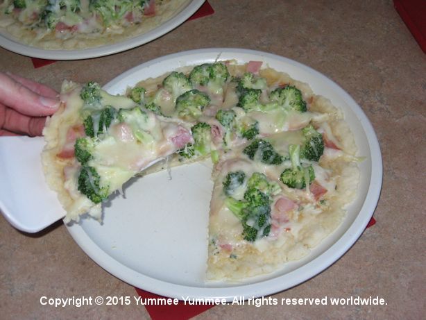 Ham, Broccoli, and Alfredo Pizza make a simply scrumptious pizza. Yum!